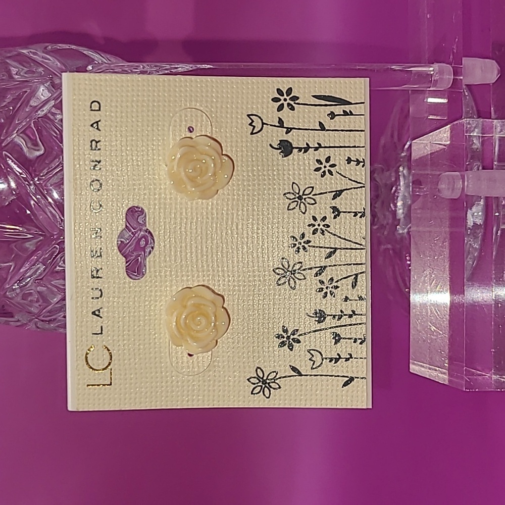 Small rose shaped earrings in off-white by Laura Conrad sold at Kohl's Nwt